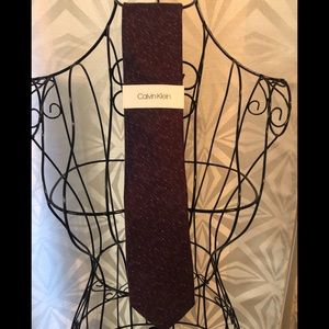 Calvin Klein men’s tie, purple. Msrp $69.50.
